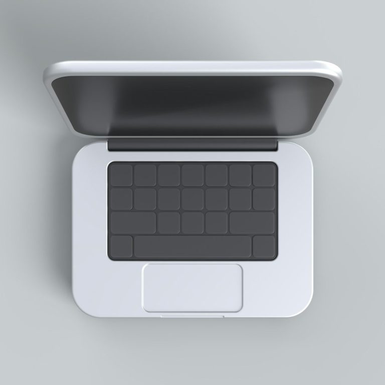 Offenes Laptop von oben mit grauer Tastatur und Touchpad.